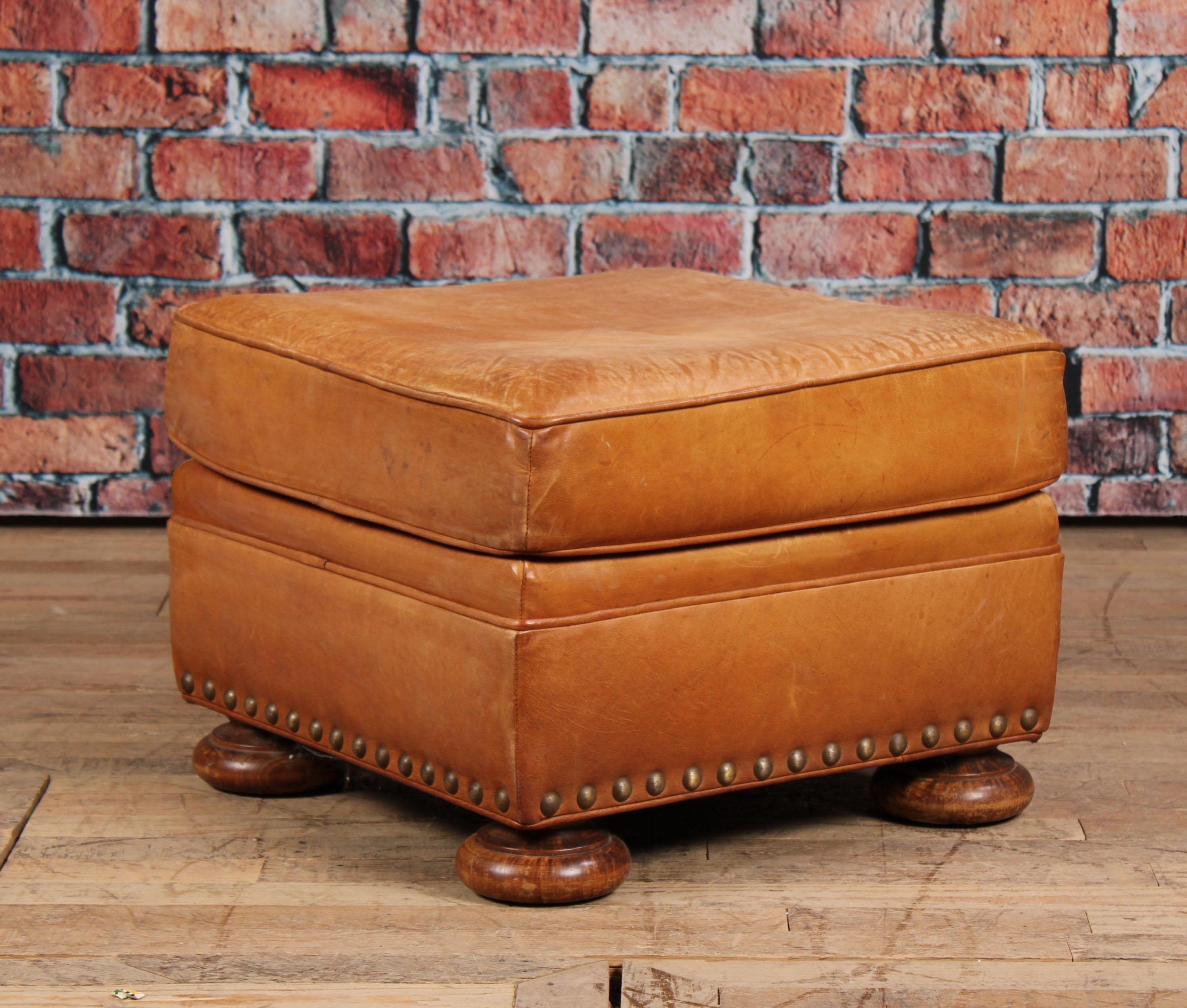 leather-ottoman-reupholstery-studded-base
